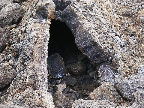opening to the underworld! An opening into a lava tube formed when lava drains from a volcano and and the edges cool down and form a crust over the still flowing lava    Geotagged,Reunion,Winter