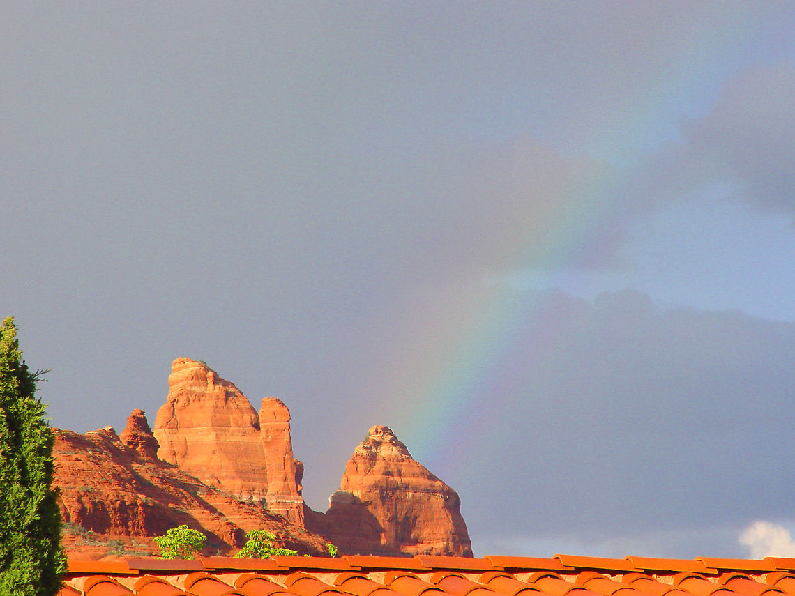 Rainbow over the Redrocks in Sedona, AZ This was taken on a trip to Sedona.  A thunderstorm was rolling in. Arizona,Sedona