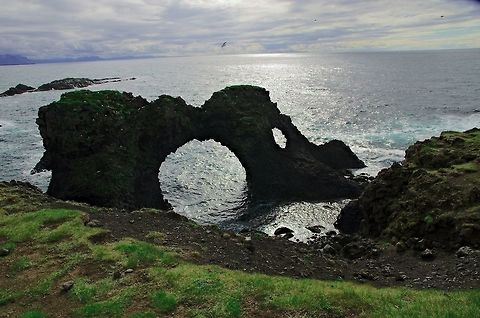 Gatklettur Rock formation Gatklettur, near Hellnar at peninsula Snaefellsnes Gatklettur,Geotagged,Iceland,Spring
