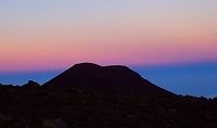 Sunset Above the Clouds This is what sunset looks like on top of a volcano, whose summit is above the clouds! Mauna Kea is a dormant volcano on the island of Hawaii. It is 4,207 m above sea level.  The summit lies above the tree line, and consists of mostly lava rock and alpine tundra, which is inhospitable to vegetation.  Since the summit is above the inversion layer, most cloud cover lies below the summit. which ensures that the air on the summit is dry. The atmospheric conditions make it one of the best sites in the world for astronomical observation.   However, the high elevation brings the risk of altitude sickness. Not to mention the incredibly steep road grade and overall inaccessibility, which make the volcano dangerous and summit trips difficult...But, very worthwhile for the adventurous!  Geotagged,Hawaii,Spring,United States,mauna kea