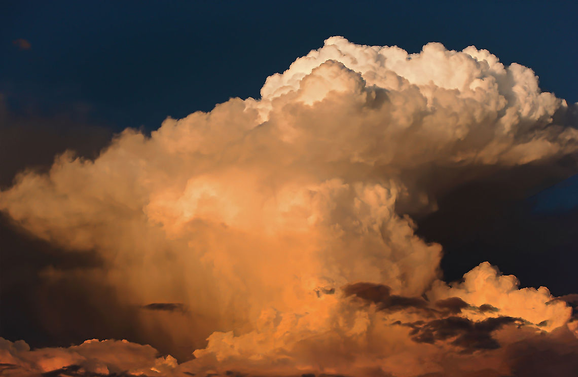 Storm cell approach It was evening, and as the sun began to set behind me, I was watching with trepidation the progress and formation of this astonishing storm cell in the east.  It began out at sea and moved toward our coast. <br />
<br />
We may have incredible views, but having built the house on the highest elevation in the town and very close to the coast, we become sitting ducks for potential monsters such as this. There's always pay back with everything. Fortunately it passed over us pretty quickly with no damage but not before dumping rain and hail and blowing the cobwebs away with some fierce winds.  Australia,Autumn,Fall,Geotagged,Natural World,Natural events,cumulus cloud,meteorology,new south wales,storm cell,thundercloud,weather