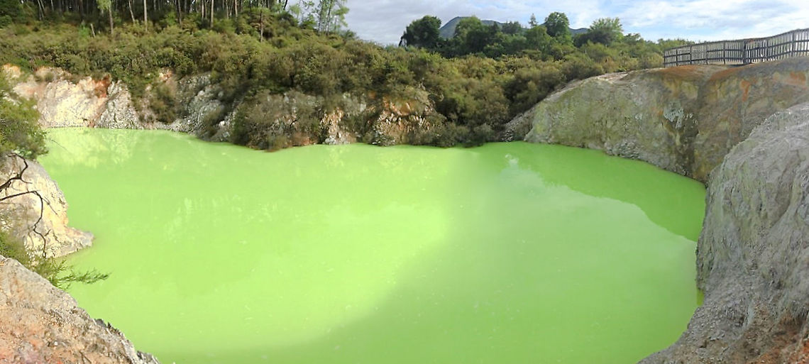 The Devil's Bath This eye-catching and awe-inspiring pool sits in a slight depression, likely created during a massive eruption from underground. <br />
<br />
It is well out of reach of visitors but the majority of it can be seen clearly from above. <br />
<br />
The bright green water and mud mix gets its colour from deposits of sulphur and ferrous salts that rise to the surface and float on top. <br />
<br />
There was quite a palette of mineral hues we saw across the location such as oranges, blues and reds that signify other volcanic elements. Geology,Geotagged,Geothermal,New Zealand,The Devil's Bath,Waiotapu,autumn,lake,landscape,scenery,volcanic lake