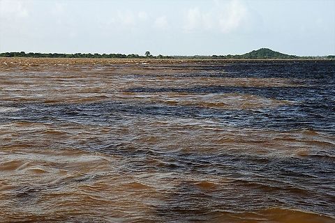 Confluence of Rio Caroni and Orinoco The tannin waters of the Rio Caroni meet the silt laden Orinoco at Ciudad Guyana - the top 2 most important rivers in Venezuela.  A mini version of the confluence of the Rio Negro & Amazon at Manaus Ciudad Guyana,Rio Caroni,Rio Orinoco