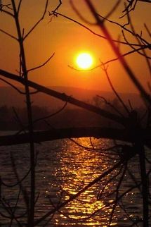 Sunset on the Columbia River Sunset on the Columbia River after the Wenatchee, WA. forest fires. sunset