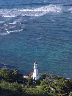 Diamond Head View A lighthouse viewed from Diamond Head on Oahu, HI Geotagged,United States,lighthouse,ocean