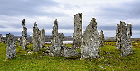 Callanais - Callanish Stones Just reminiscing pre-covid. A wild and windy day at this quite entrancing and spiritual location.

Neolithic people erected the Callanish Stones about 5,000 years ago. Though the stones served as a hub for ritual activities for at least a millennium, their exact purpose has been lost to history. The most prevalent theory, based on recent archaeological excavations, holds that the megaliths acted as some sort of astronomical observatory or a celestial calendar.

https://www.atlasobscura.com/places/callanish-stones Fall,Geotagged,United Kingdom
