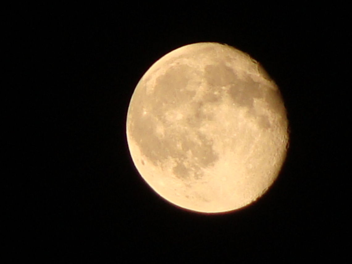 Full moon An orangish closeup of a full moon. Fullmoon,Moon