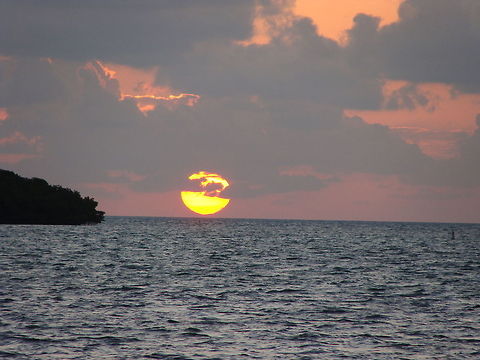 Sunrise in Key West The sun comes up to shine pink orange rays of light into the Key West area. Geotagged,Key West,Sunrise,United States
