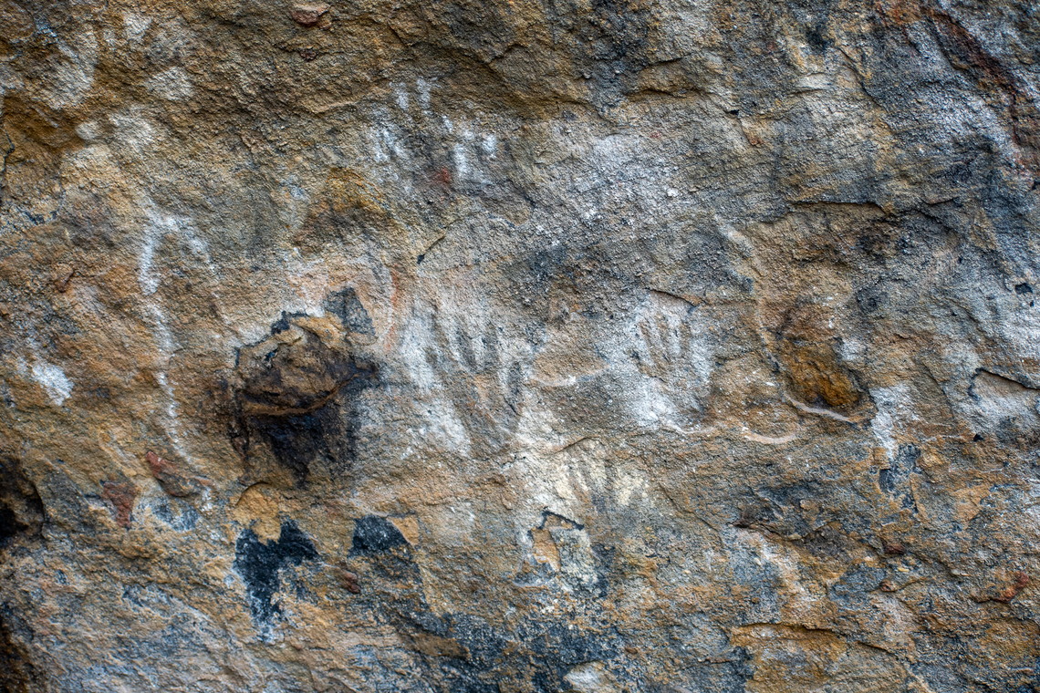 Blackfellows Hand Cave The shelter included a separate men&rsquo;s and women&rsquo;s area, in addition to a women&rsquo;s birthing area.<br />
The drawings here have been well preserved over millennia. There are drawings shaped like hands, arms and weapons.  Australia,Geotagged,Summer