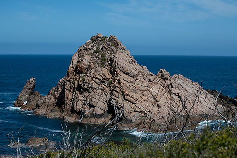 Sugar loaf rock This is a large natural granite rock that rises out of the Indian Ocean. It is separated by a thin channel of treacherous water that separates it from the mainland! It is one of the most photographed rocks in Australia and has appeared on the cover of  National Geographic magazine. It is a nesting site for seabirds and the most southerly nesting site for the red-tailed tropic bird! Alas we didn’t see any  today! Australia,Geotagged,Spring