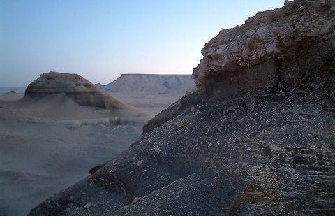 White desert rock formations Mountains eroded over time. The White desert is a national park in Egypt and borders with the Black desert where the rocks are covered with black volcanic rocks. If memory serves me correctly I took these photos somewhere in between the two deserts. When you enter the White desert fully, everything is a stark white. Egypt,Geotagged,Landscapes,Mountains,White desert,black desert,egypt,national park