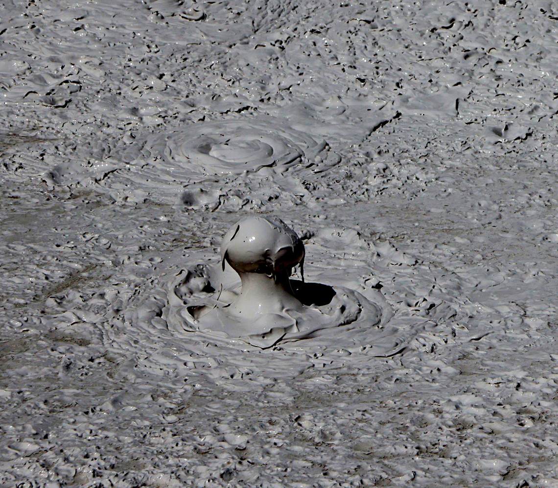 Mesmerizing mud pot bubbles Like a big pot of boiling mush or porridge, one could watch this hypnotic bubbling for some time. The different mud colors come from oxidation states of the iron in the mud. The heat in the caldera forces pressurized water up through the ground, and also gasses causing the bubbling action.  In the early summer, the mud is watery from the high-water table due to rain and snow melt. By the end of summer, the mud is much thicker as the water table drops.<br />
5N4A4911<br />
<figure class="photo"><a href="https://www.jungledragon.com/image/161239/mud_pot_bubble.html" title="Mud pot bubble"><img src="https://s3.amazonaws.com/media.jungledragon.com/images/5803/161239_thumb.JPG?AWSAccessKeyId=05GMT0V3GWVNE7GGM1R2&Expires=1769040010&Signature=SsUwDoYIIzMvcwkFf5NaOdWRNg0%3D" width="200" height="136" alt="Mud pot bubble Like a big pot of boiling mush or porridge, one could watch this endless hypnotic bubbling. The different mud colors come from oxidation states of the iron in the mud. The heat in the caldera forces pressurized water up through the ground, and also gasses causing the bubbling action. In the early summer, the mud is watery from the high-water table due to rain and snow melt. By the end of summer, the mud is much thicker as the water table drops.<br />
5N4A4976 Geotagged,Spring,United States" /></a></figure> Geotagged,Natural events,Spring,United States;Yellowstone