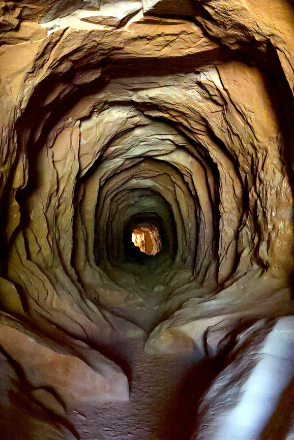 Belly of the Dragon The name alone compelled us to stop and take a look. It is a carved tunnel that goes under Highway 89 about 16 miles north of Kanab, Ut. It is used as a drainage line for the upper canyons that feed into the North Fork River. Geotagged,United States