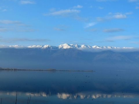 Mountain reflection in lake Kerkini When the sky cleared up in the late afternoon we were able to see this beautiful mountain. Geotagged,Greece,Mountain,Spring,lake Kerkini,reflection