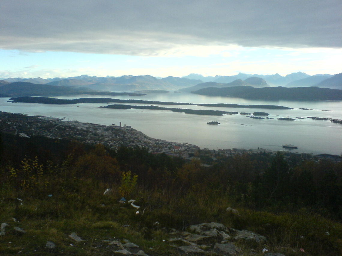 Sunnmørsalpene, Norway The mountains you see in this picture, is very popular in Norway they are popularly called &quot;Sunnm&oslash;rsalpene&quot;. This picture was taken from the mountainside over the city of Molde. Fannefjorden,Geotagged,Landscapes,Mountains,Norway,landscape,nature