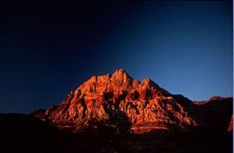 Sunset In this pic the sun is setting in front of a huge sandy Mountain. Mountain,Sandy,Sunset