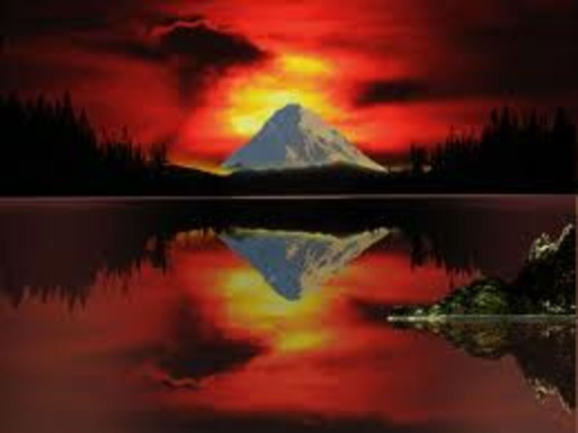 Sunset In this picture, sun is going to set behind a huge snow mountain, which is surrounded by forests and there&#039;s a lake in front of&#039;em.<br />
 Forests,Mountain,Snow,Sunset