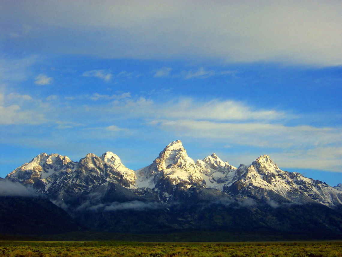 Good Morning Tetons The Teton Mountain Range comes to life with the morning sun. The peaks are, from left to right, South Teton, Middle Teton, Grand Teton, Mount Owen and Teewinot. These five peaks are sometimes referred to as the &quot;Cathedral Group&quot;. Geotagged,Grand Teton National Park,Landscapes,Sunrise,United States,Wyoming