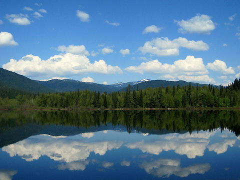 Reflection This picture was captured the first week I was in Idaho the summer of 2011 for a seasonal job doing fisheries work. It was one of the best weeks of the best summers of my life, as it was my first time ever in western North America and also when I realized that photography was going to be a lifelong passion of mine.  Geotagged,Idaho,Mountains,National Forest,Reflection,United States