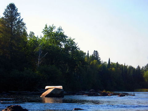 Abandoned Someone's vessel, their means of transportation down a wild and rocky river, abandoned high upon a boulder, left to rot and it's natural elements to return to nature. Geotagged,United States,scenery