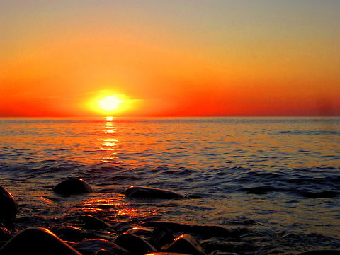 Lake Superior Sunset The sun sets on another day over the shoreline of Lake Superior, only to bring light to a new day in another part of the world. Captured in Michigan's upper peninsula. Geotagged,Lake Superior,Michigan,Sunset,United States