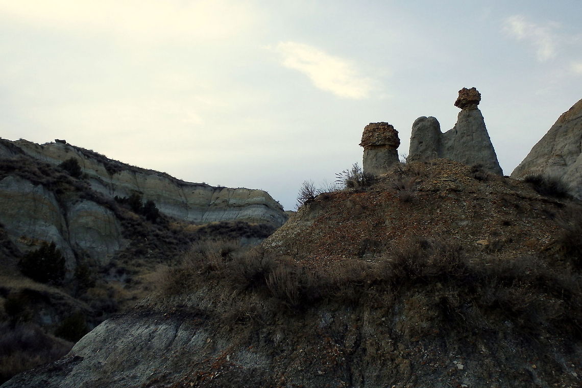 Pillars Some pillar formations caused by erosion from wind and rain. Geotagged,North Dakota,Theodore Roosevelt National Park,United States
