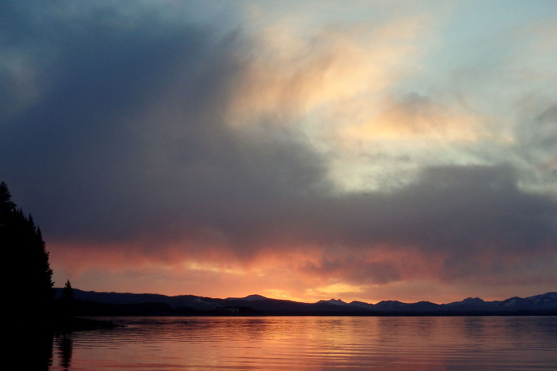 Yellowstone Lake Sunrise Early morning sunrise over the Absaroka Mountian range in Yellowstone National Park. Sunrise,Yellowstone National Park