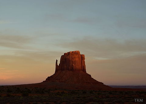East Mitten - Monument Valley This monument is called east mitten: mitten because if you look at it right, it resembles a mitten you would wear in winter, and east because it is one of two monuments that resemble a mitten and it is the one to the east. I love how the sun is just hitting the corner of the monument in this photo.  Arizona,Geotagged,Monument Valley Tribal Park,United States,fall,landscapes,sunset