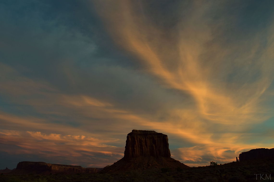 Merrick Butte Sunset - Monument Valley In this photo you see the setting sun lighting up the dramatic clouds over Merrick Butte in northern Arizona&#039;s Monument Valley. This is my personal favorite photo from my Monument Valley series. Arizona,Geotagged,Monument Valley Tribal Park,Sunset,United States