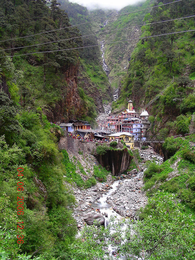 Yamunotri This picture showcases the beautiful Yamunotri Temple situated near Yamnotri Range. This temple is also the birth place of the mighty river Yamuna, seen in the pic. Geotagged,India