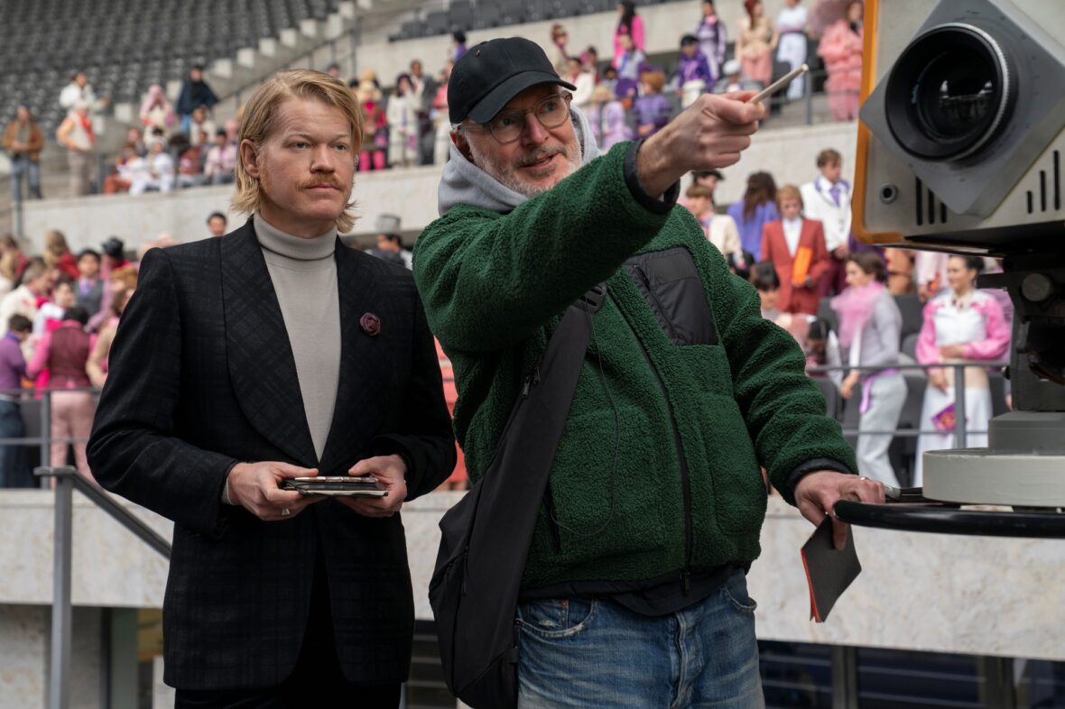 Behind the scenes photo of Jesse Plemons and director Francis Lawrence on set of The Hunger Games: Sunrise on the Reaping