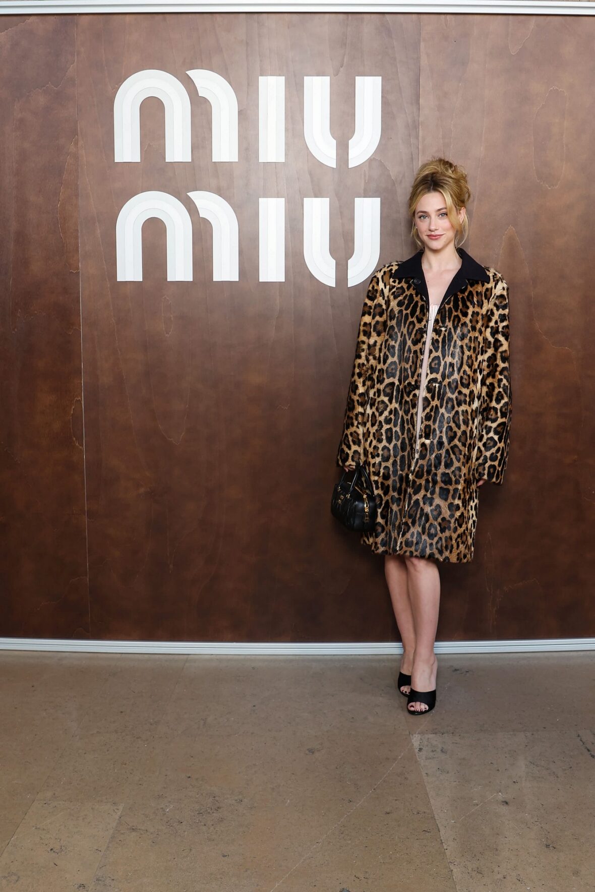 Lili Reinhart attends the Miu Miu fashion show in Paris