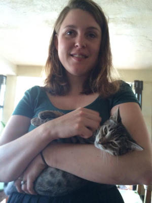 One of the many "bad" photos of me. emma mcgowan with cat