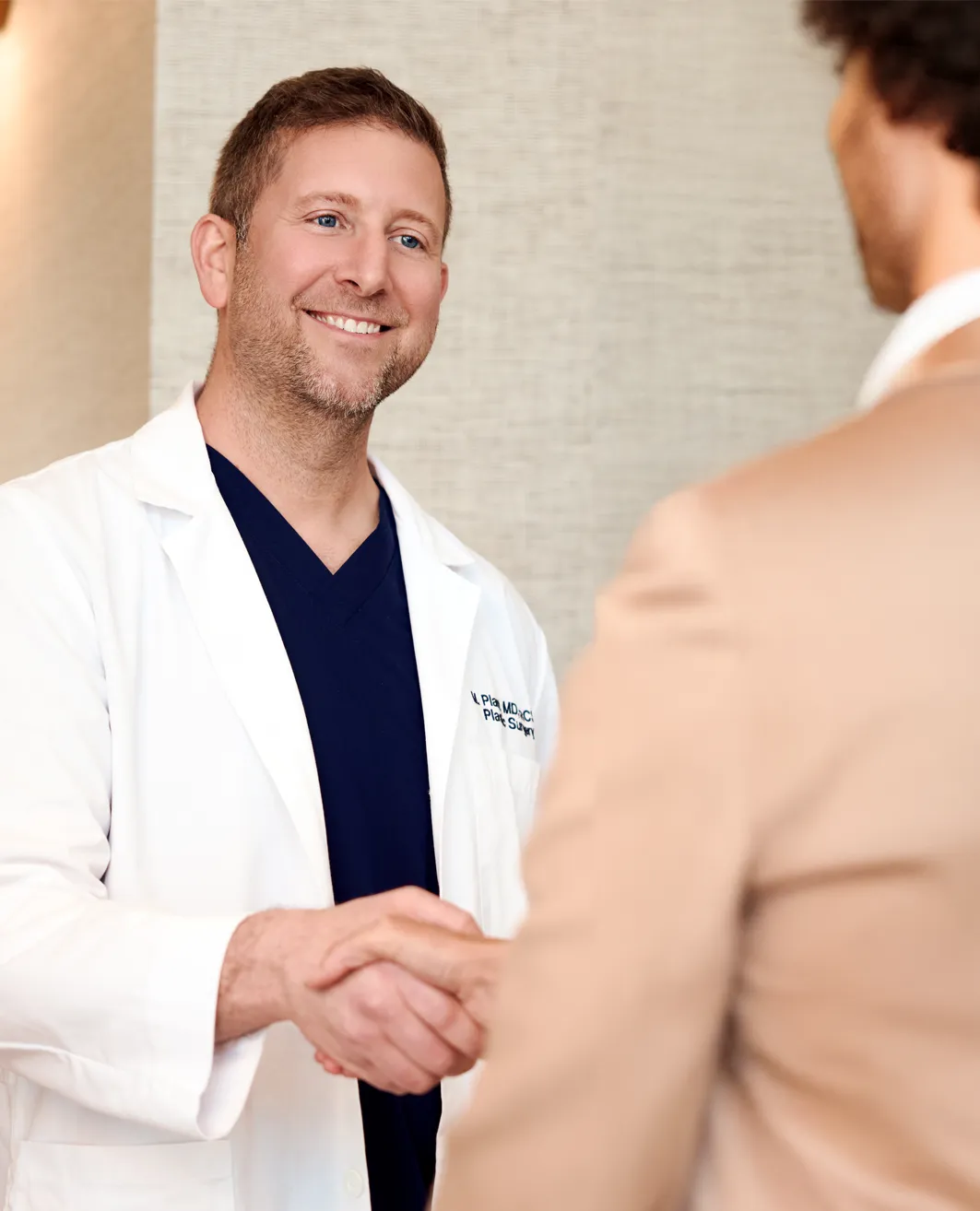 Dr. Mathew Plant meeting a patient for a consultation