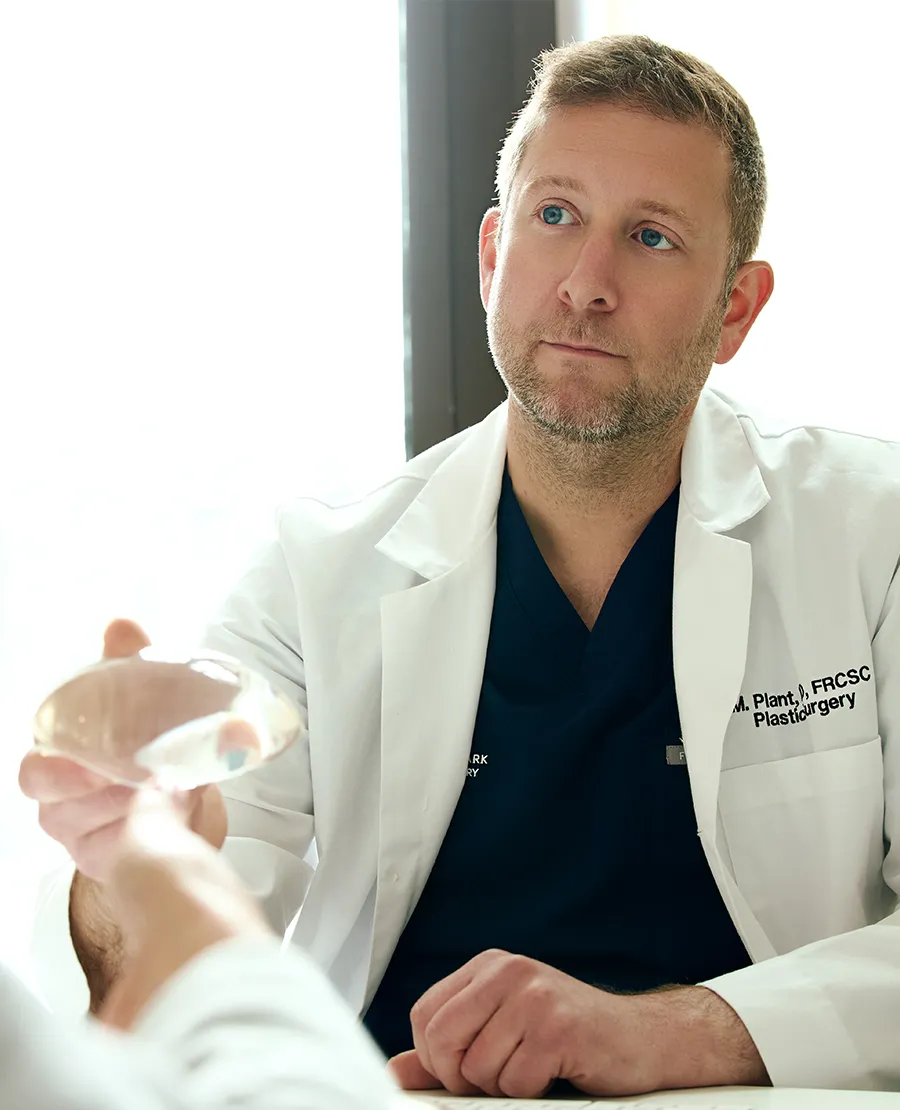 Dr. Mathew Plant speaking to a patient during a consult