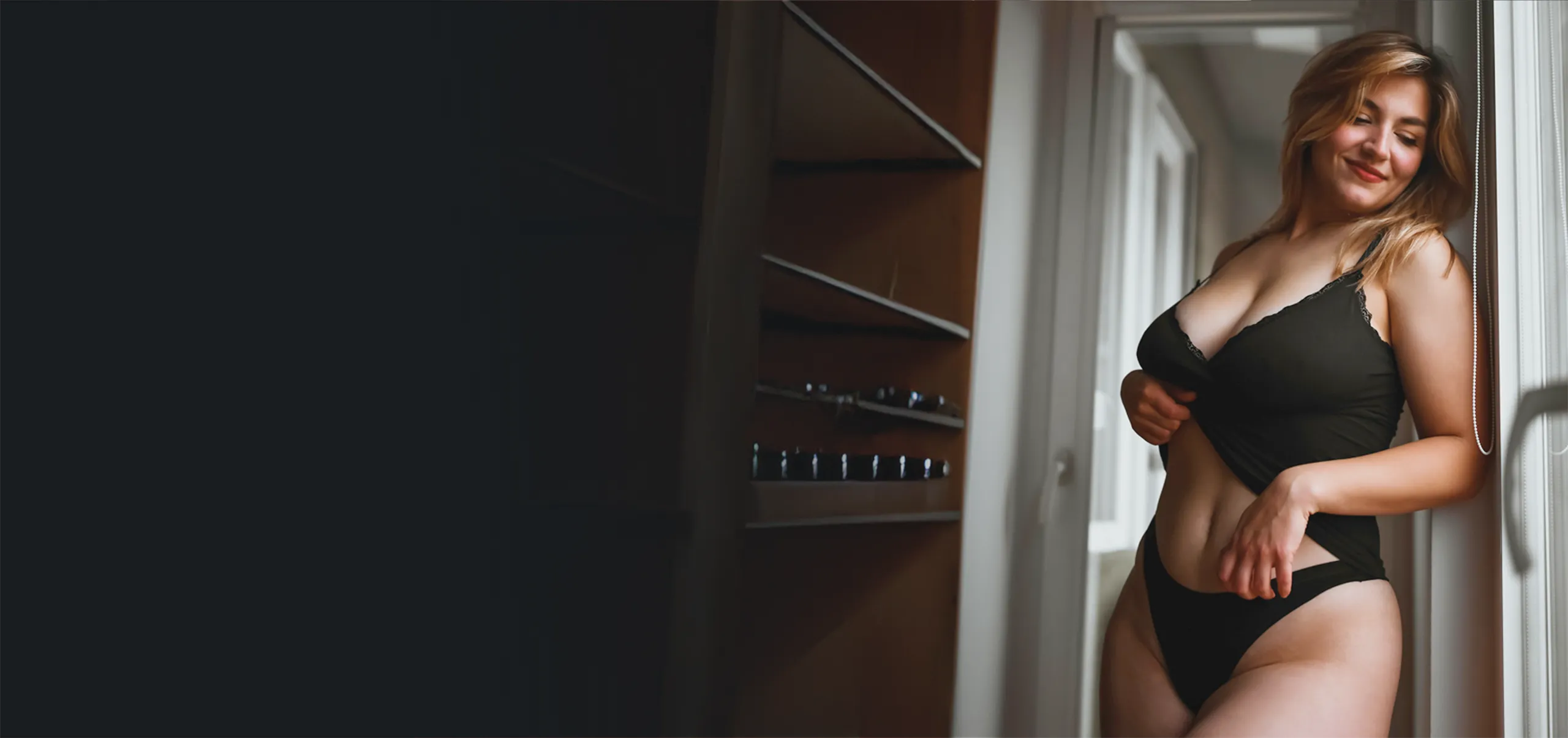 Woman standing in wardrobe
