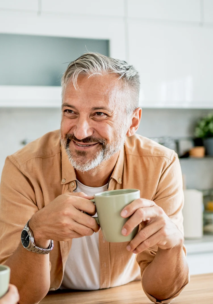 Man talking to woman in a kitchen