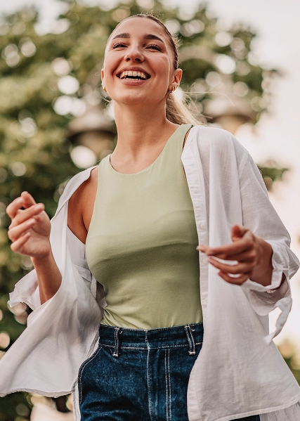 Woman smiling and running