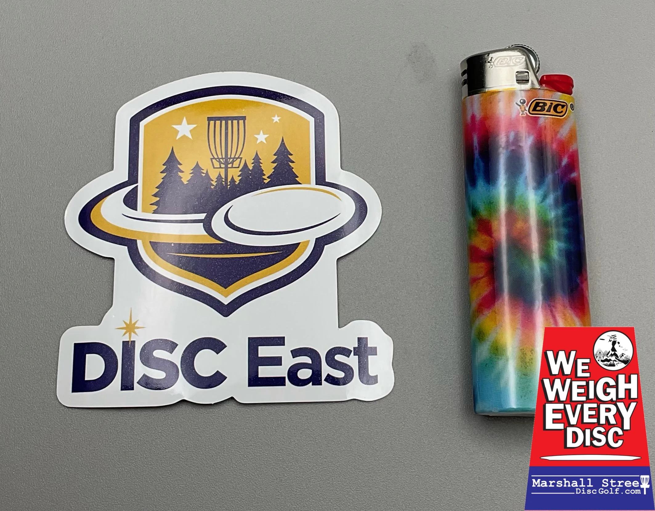 249293 DISC East Expo Logo Sticker - NavyYellow, ~3" x 2"
