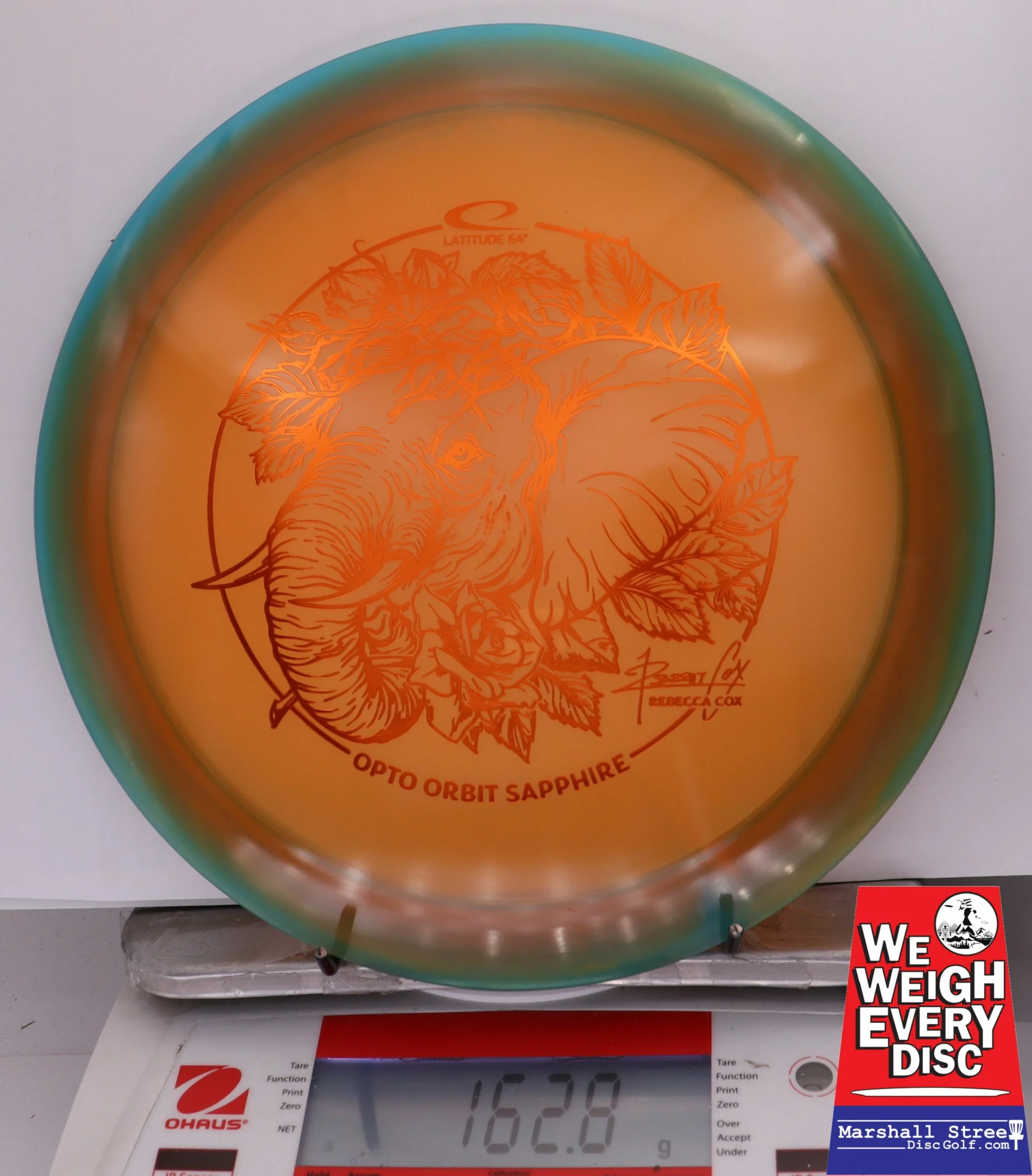328215 Opto Orbit Sapphire, Rebecca Cox 2025 Team Series - #21 Green-Orange, 163