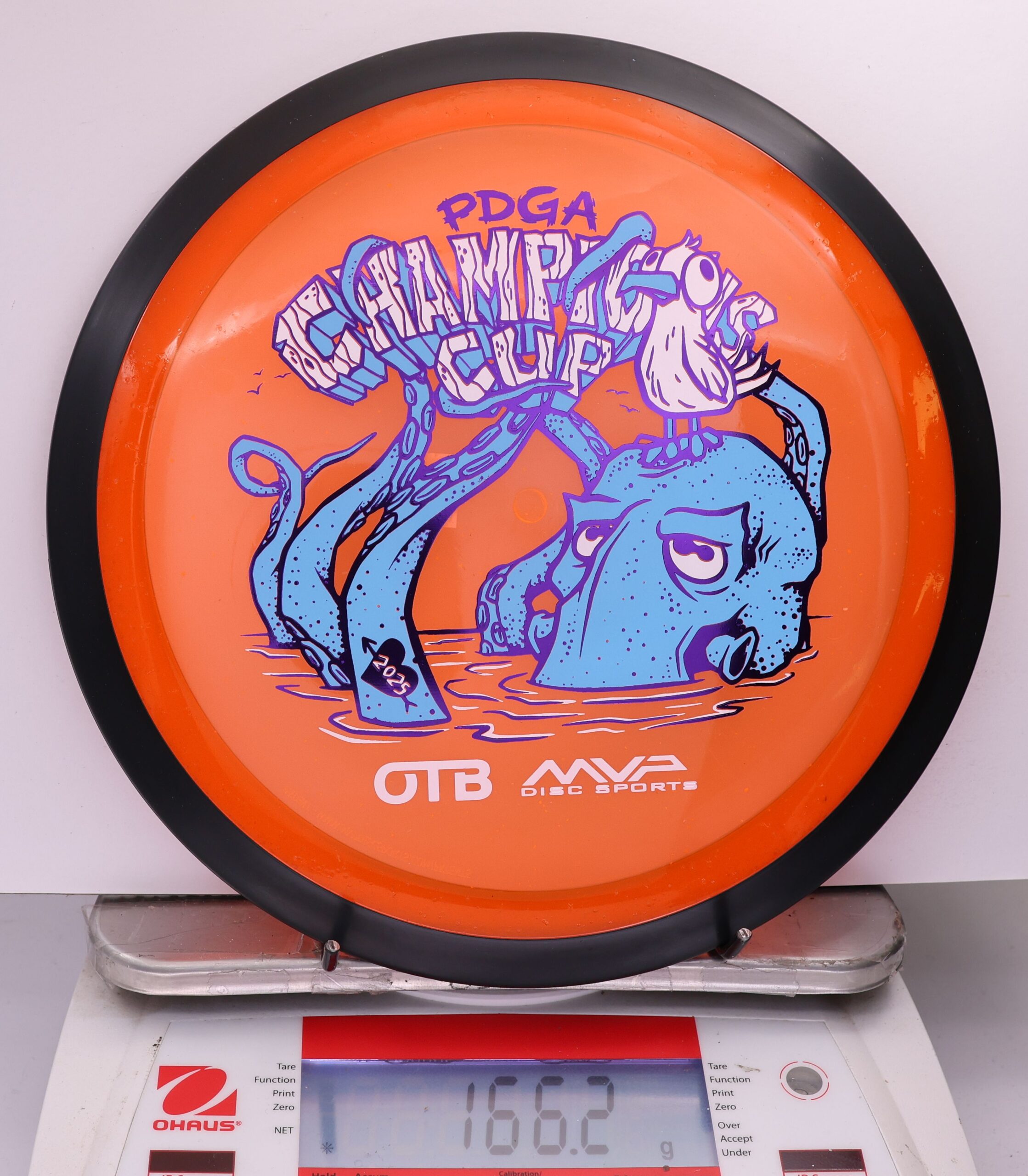513112 Particle Glow Proton Wave, PDGA Champions Cup 2025 - #345 Orange, 166
