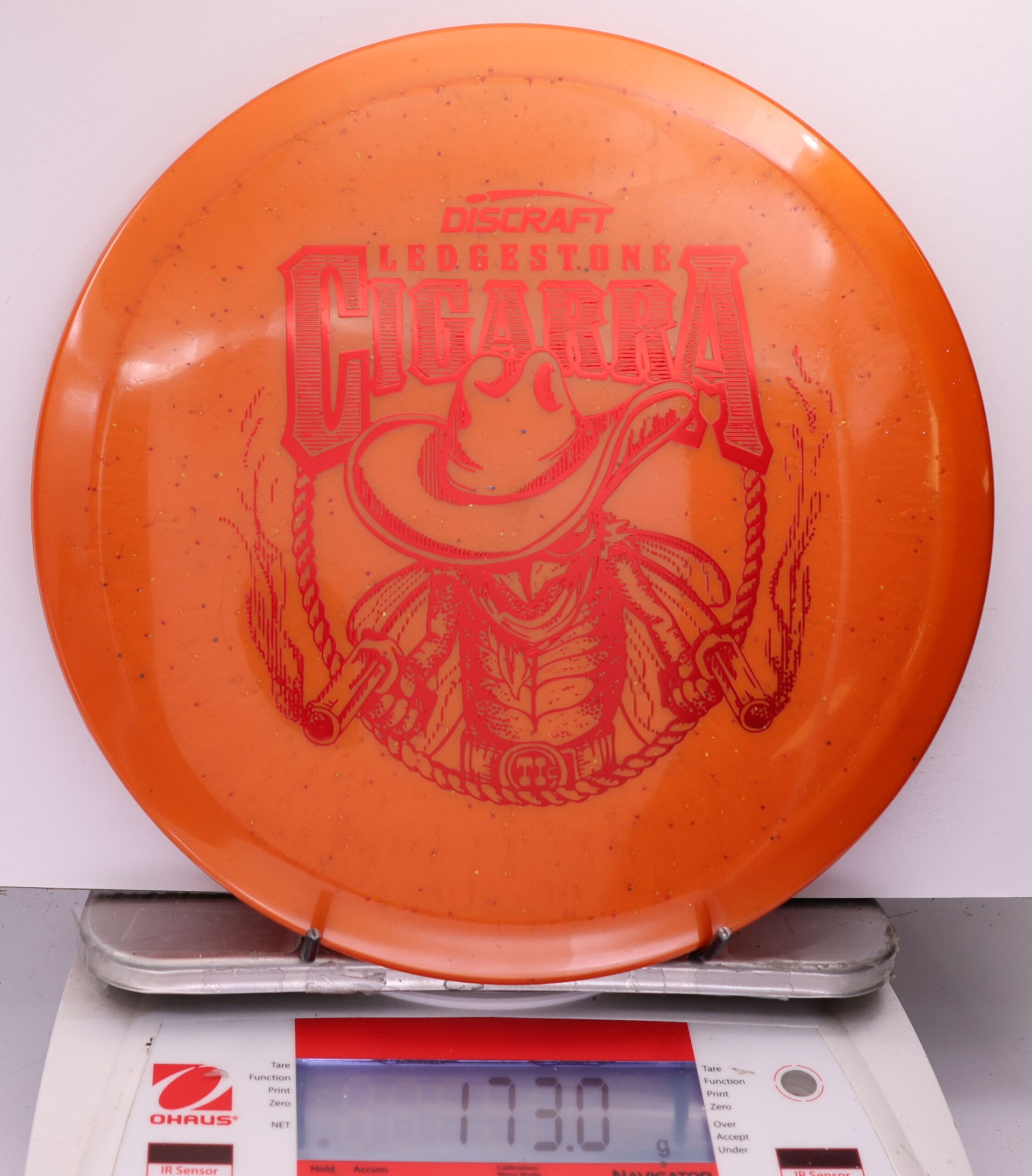 532652 Titanium Sparkle Cigarra, 2026 Ledgestone Edition - #16 Orange, 173