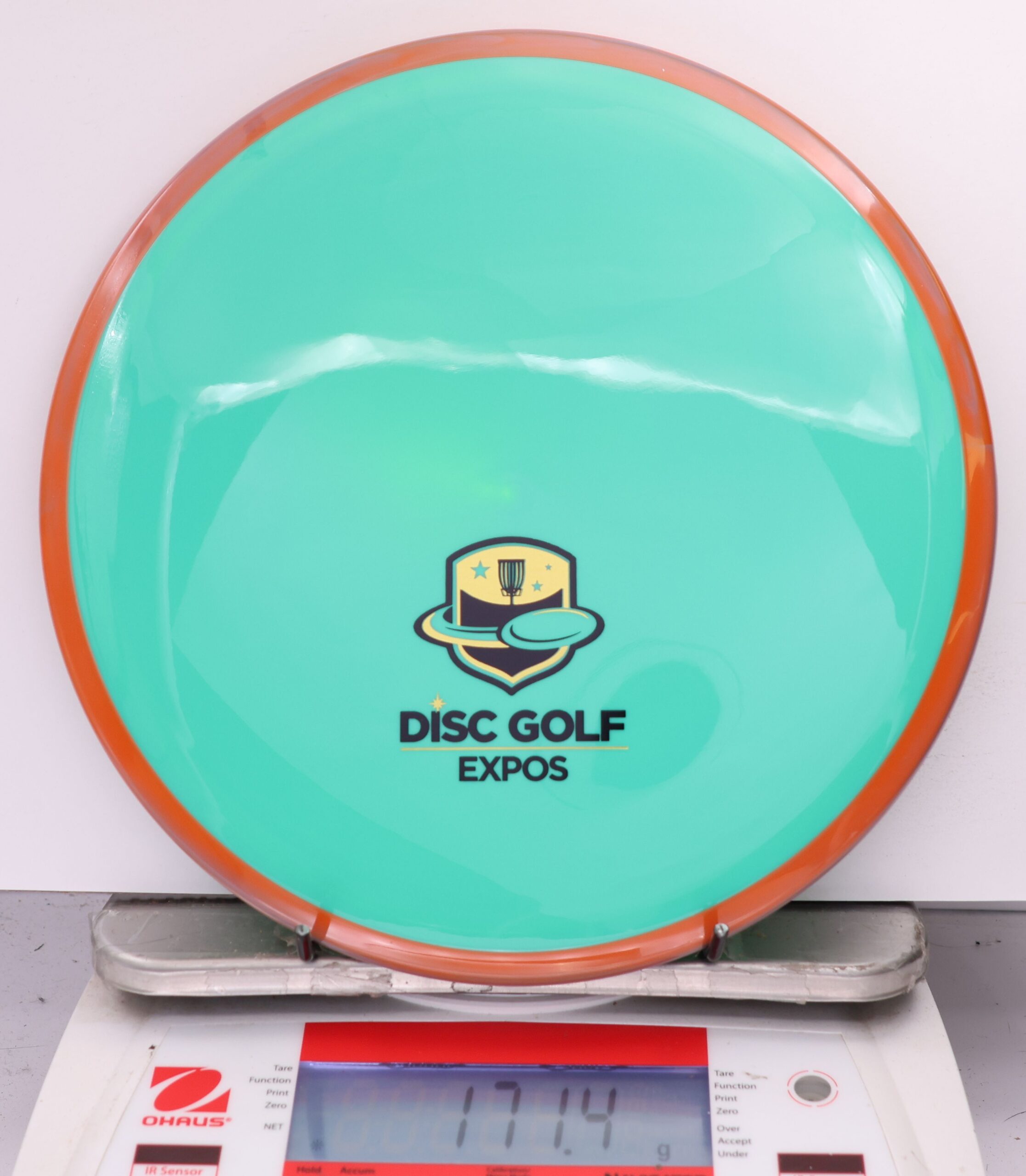 584693 Neutron Crave, 2026 Disc Golf Expos - #15 Orange-TealGrn, 171