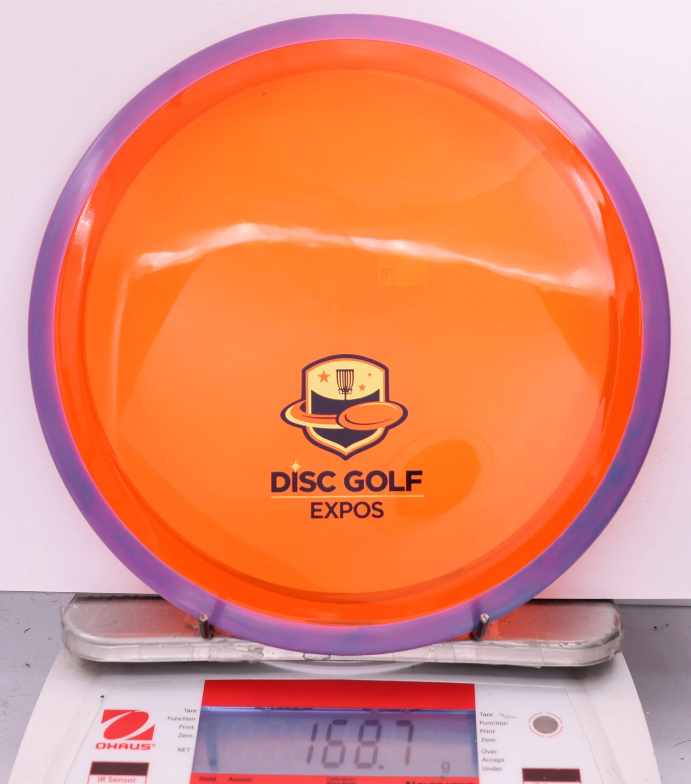 586025 Proton Insanity, 2026 Disc Golf Expos - #28 Purple-Orange, 169