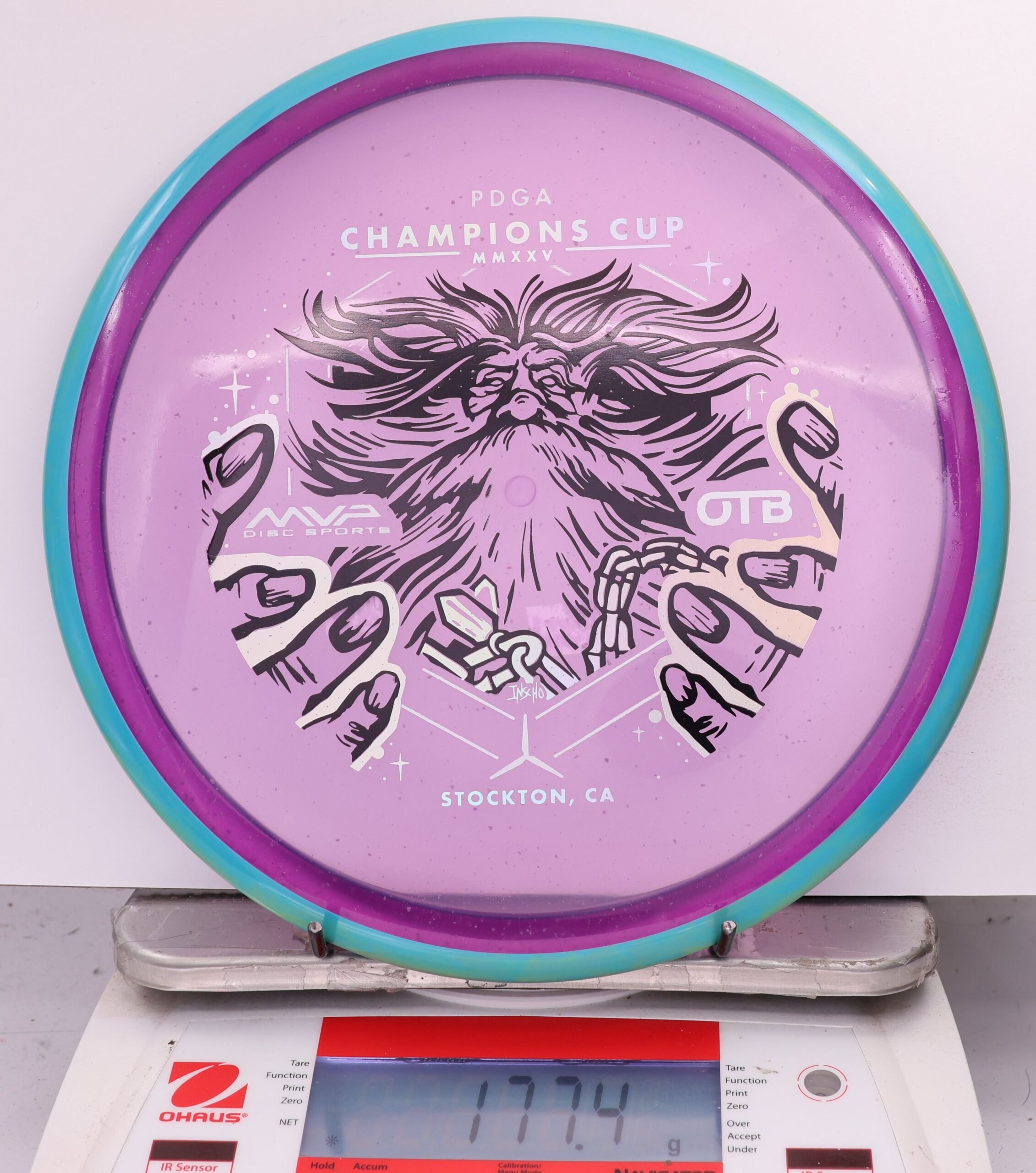 588932 Particle Glow Proton Hex, PDGA Champions Cup 2025 - #01 Blue-Purple, 177