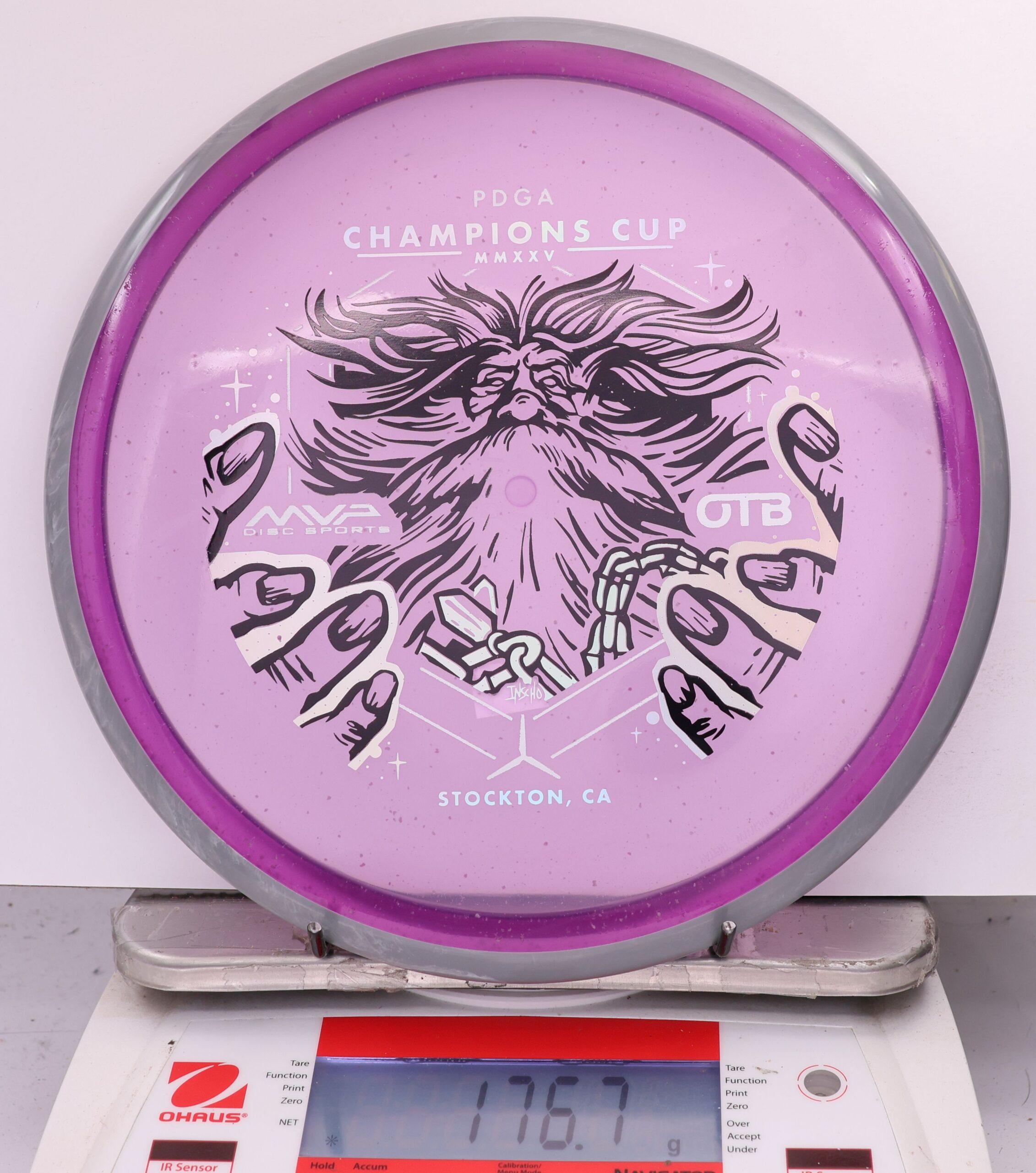 588934 Particle Glow Proton Hex, PDGA Champions Cup 2025 - #03 Gray-Purple, 177