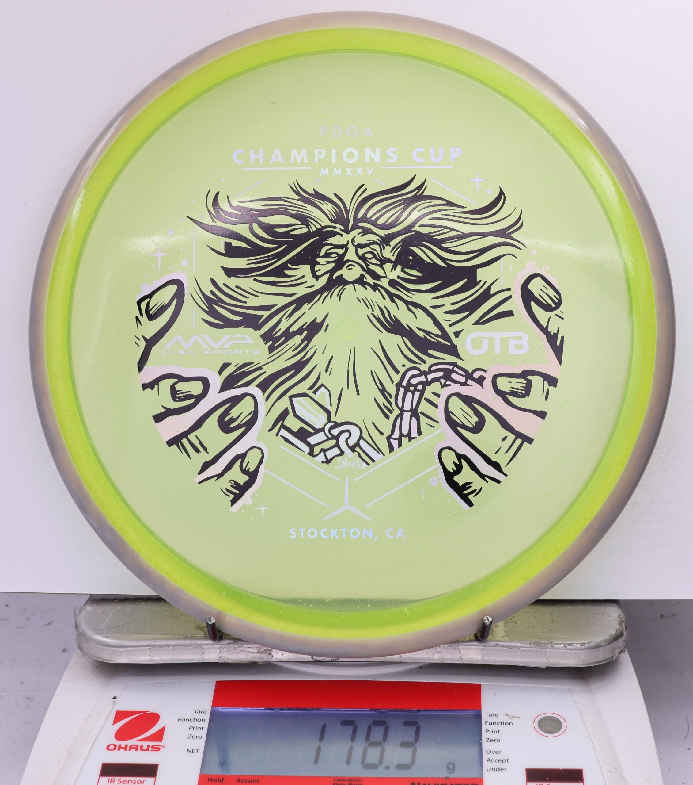 588948 Particle Glow Proton Hex, PDGA Champions Cup 2025 - #07 Gray-Grellow, 178
