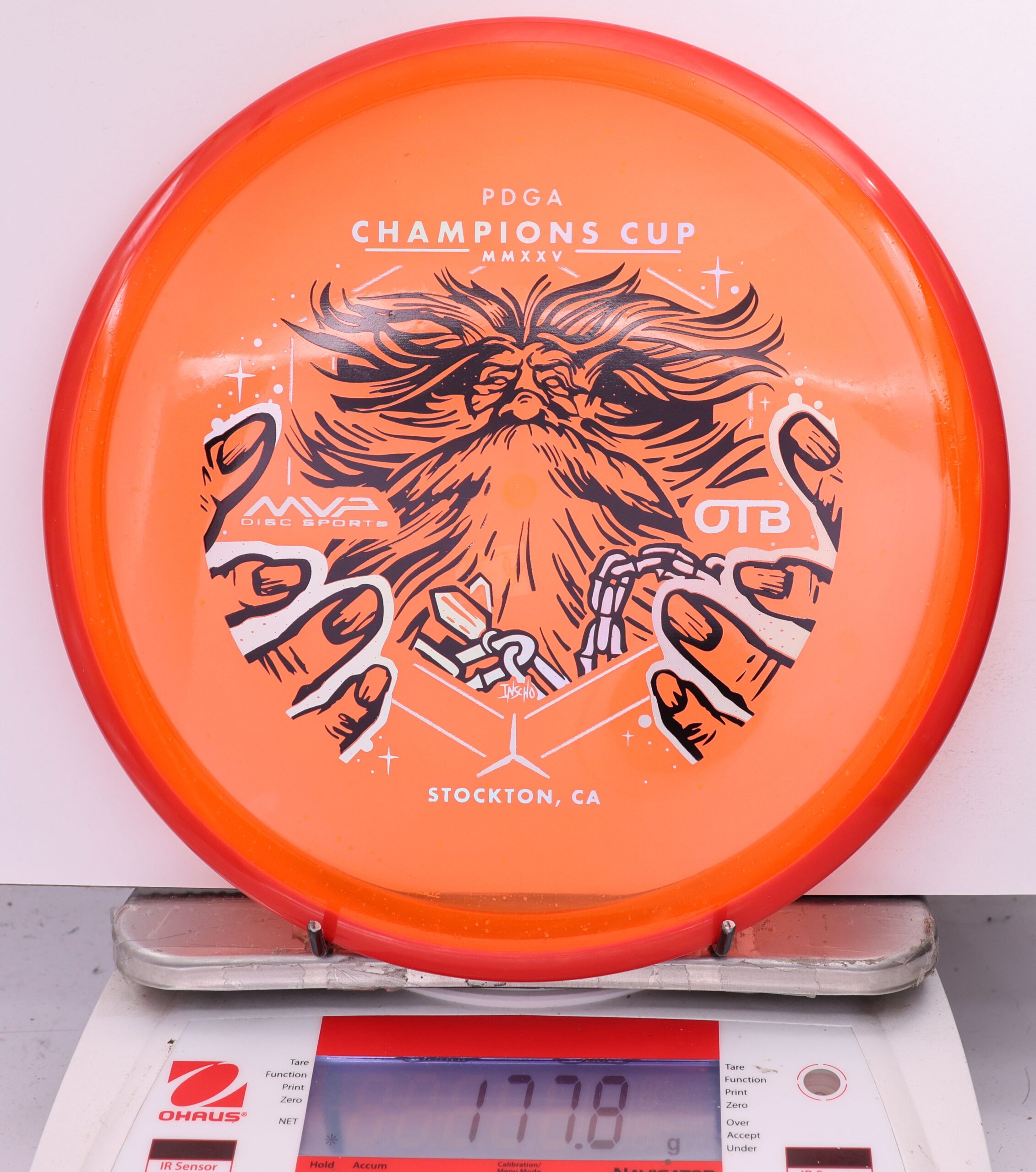 588950 Particle Glow Proton Hex, PDGA Champions Cup 2025 - #09 Red-Orange, 178