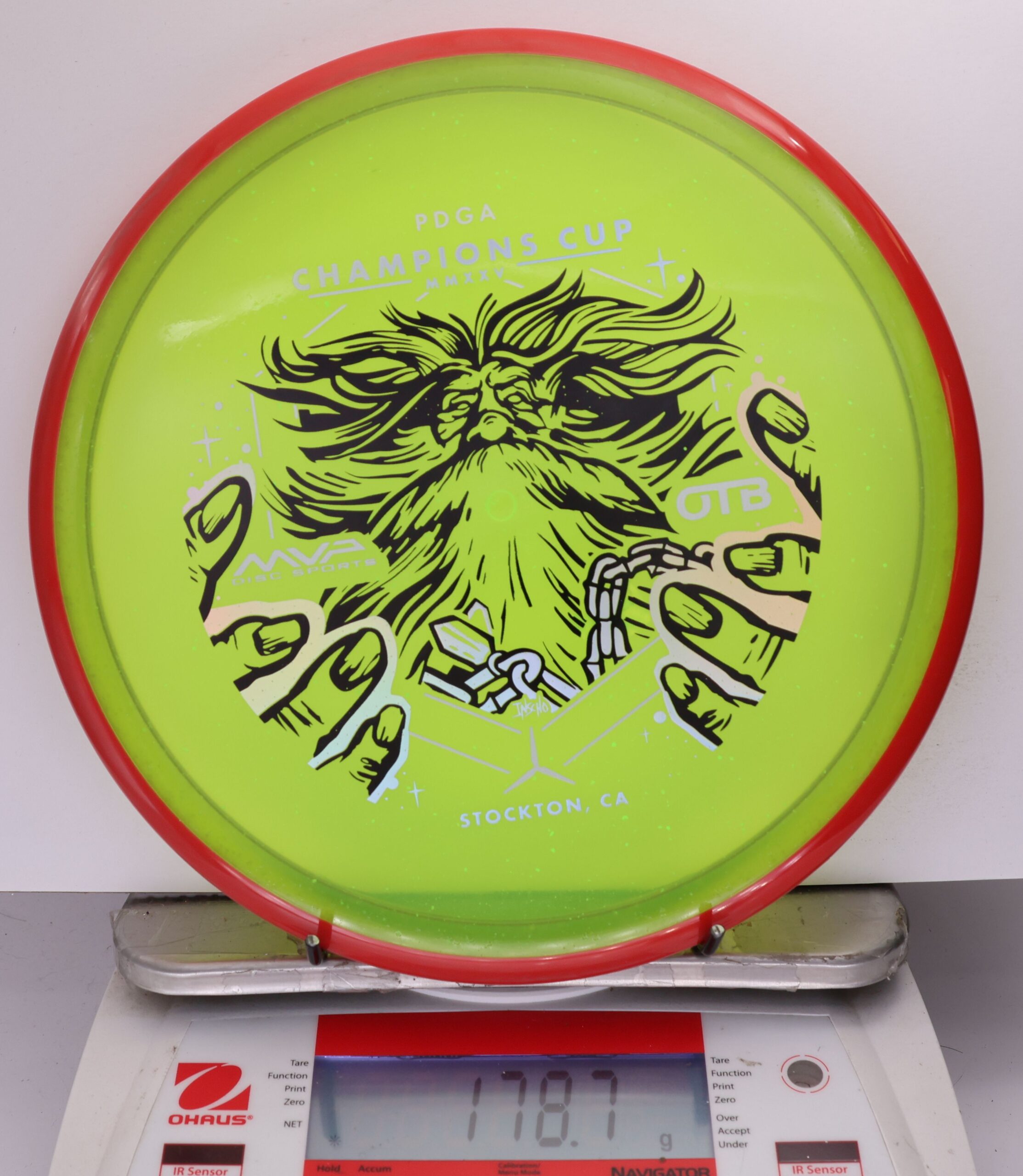699579 Particle Glow Proton Hex, PDGA Champions Cup 2025 - #355 Red-Green, 179