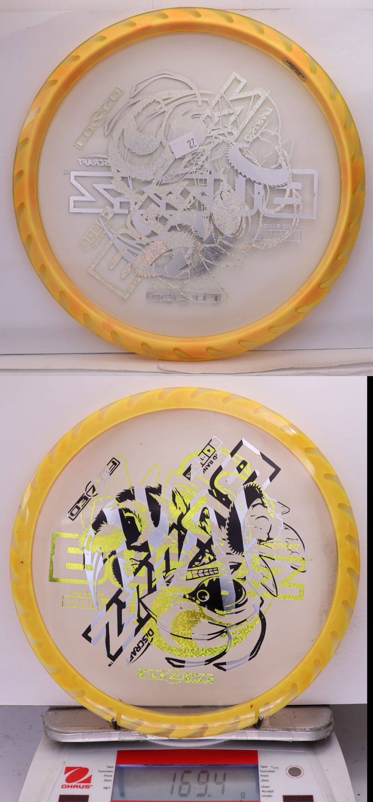 756122 X-Out Fuzed Line Buzzz - Buzzzsaw - #27 Clear-LtOrange, 169